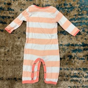 0-3 months. Burts Bees onesie.